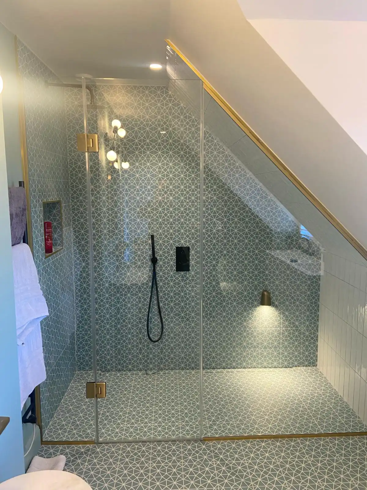 Attic wet room with brass fittings