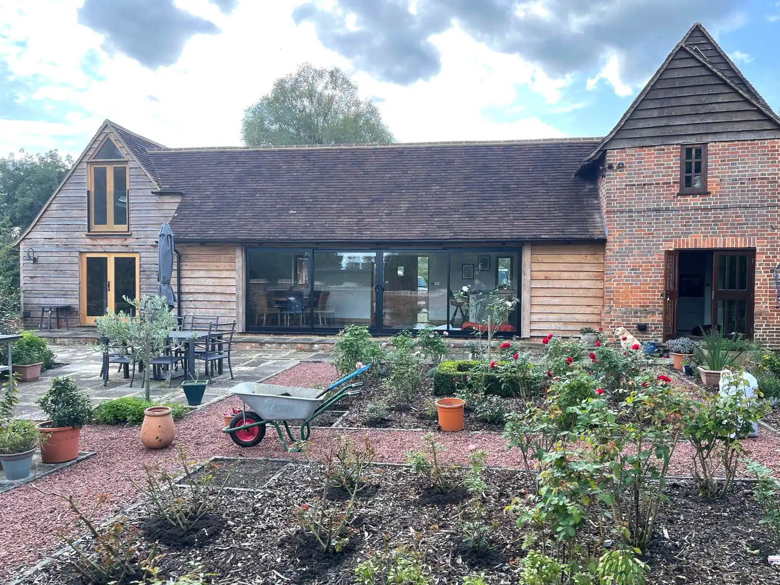 Restored oak-framed barn conversion and gardens in Kent