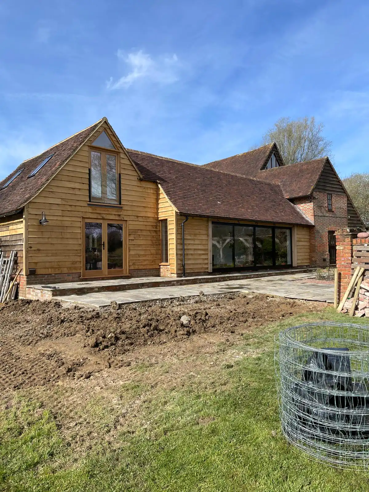 Oak framed barn building with clay tiled roof
