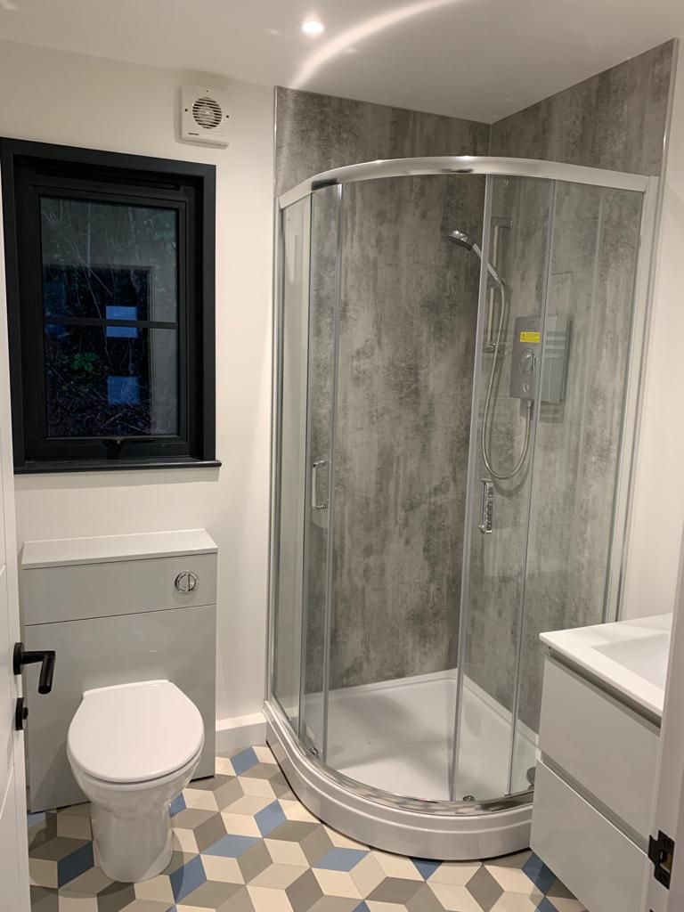 Shower room with a corner shower