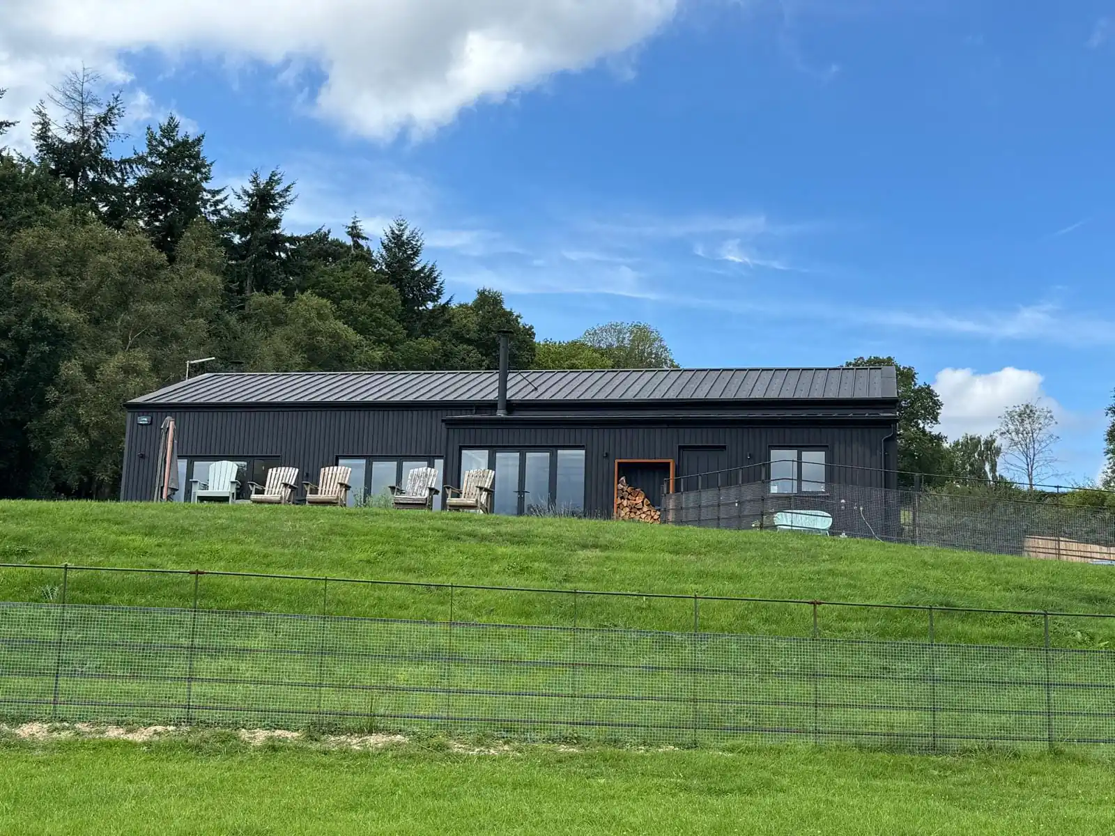 The barn seen across the paddock